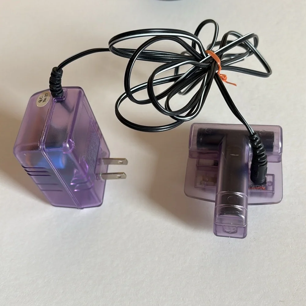 AC/DC power adapter and 2 battery packs for Nintendo Game Boy Color
